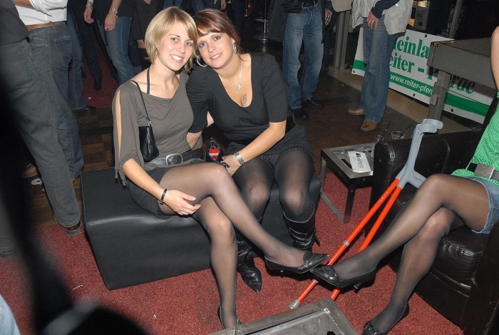 Wife dresses on a corporate party