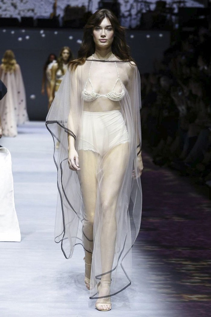 Models of the catwalk with big breasts