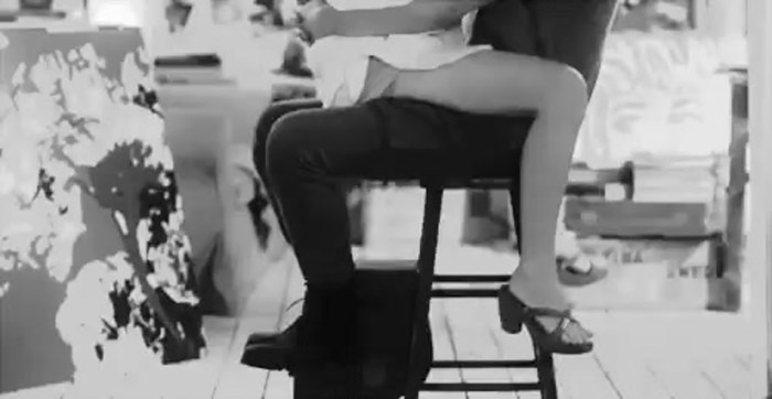 Caresses under the table