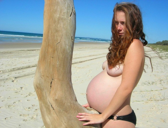 Pregnant women with big tits on the beach