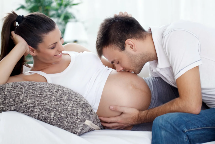 Pregnant woman and man