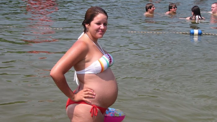 Mature pregnant women in swimsuits