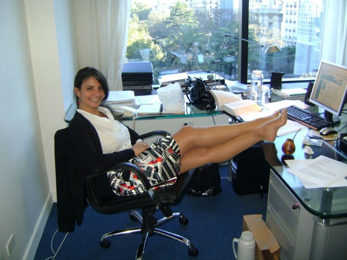 Legs under the table in the office