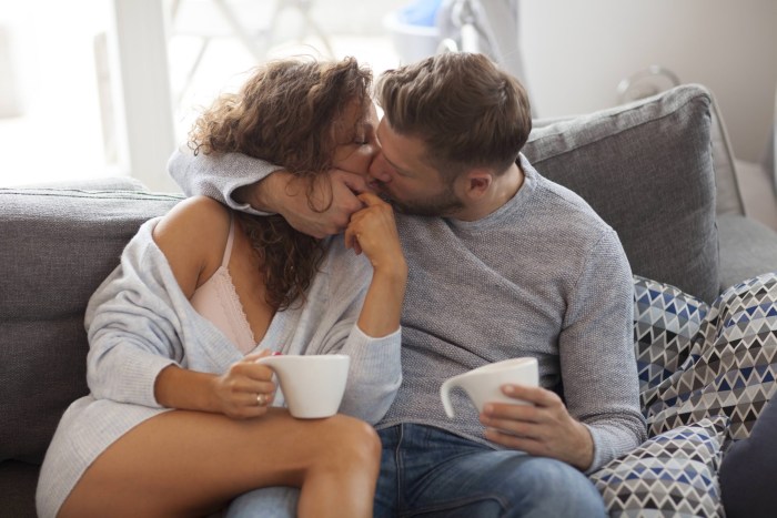 The husband kisses his wife