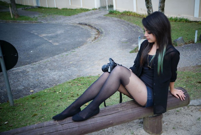 Schoolgirl's legs in pantyhose