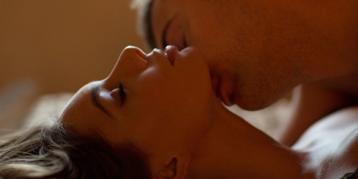 Passionate kisses in bed