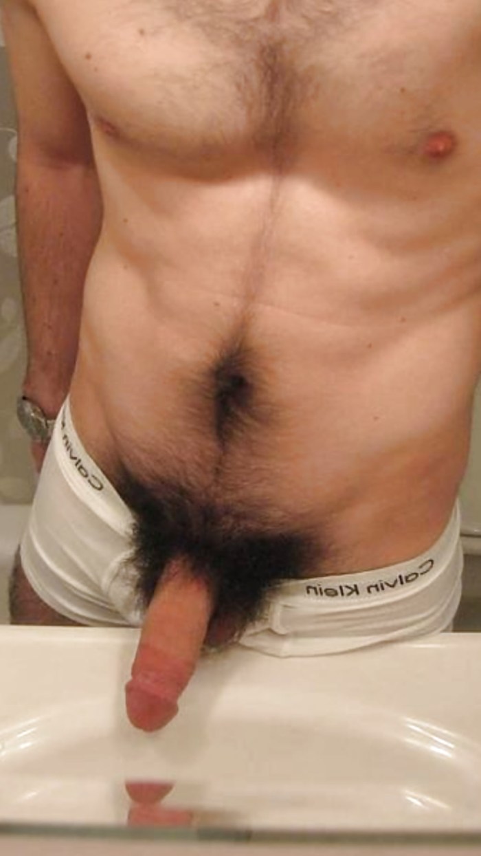 Big hairy dick in shorts
