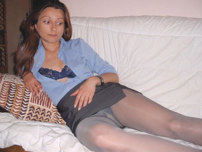 Mature in stockings spread her legs