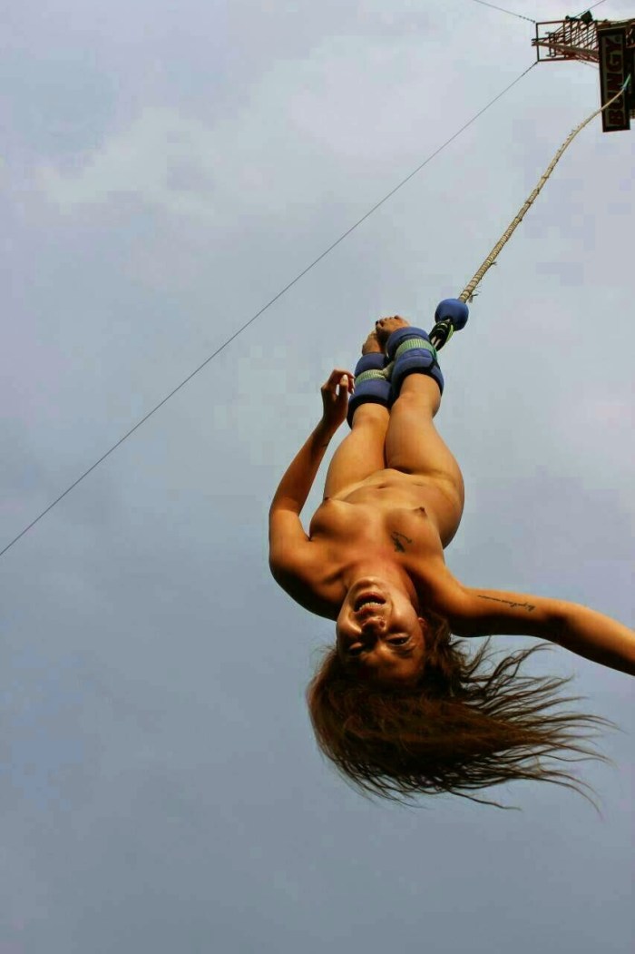 Girls jump into the water nude