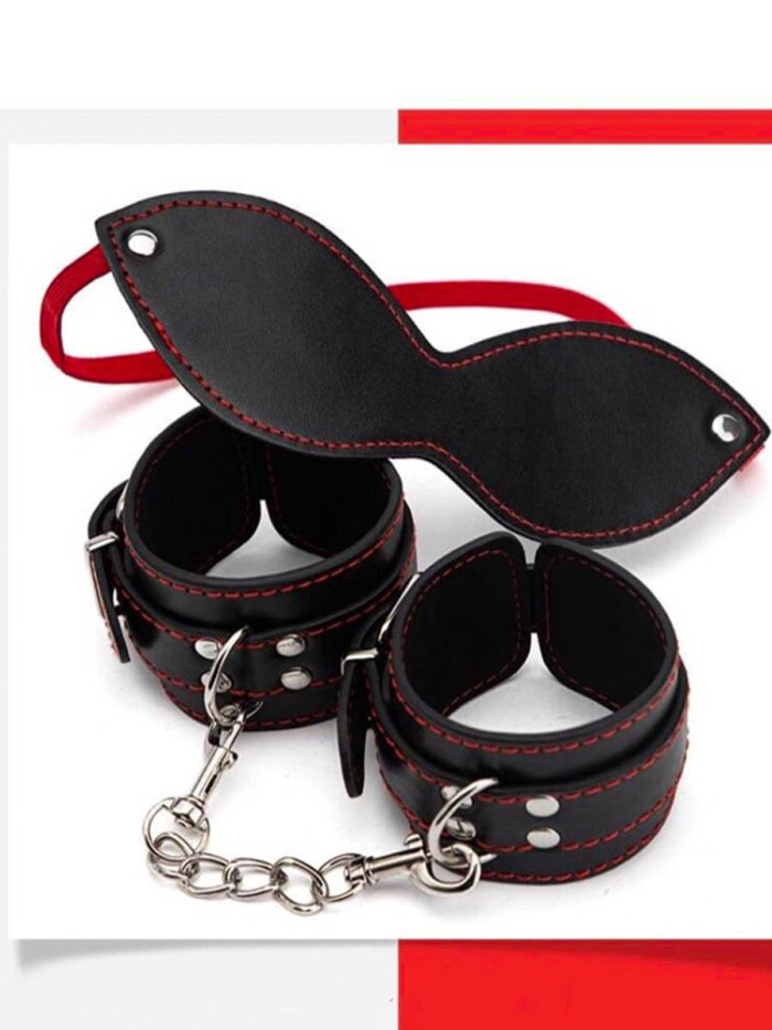 Handcuffs on the hands of a girl