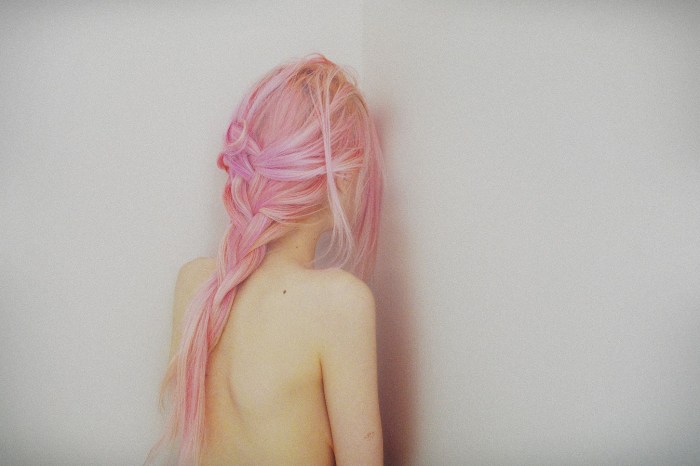 Girl with pink hair from the back