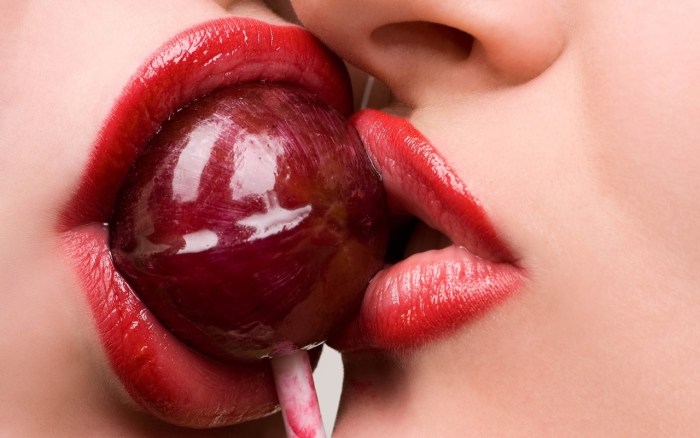 Female lips with a tongue