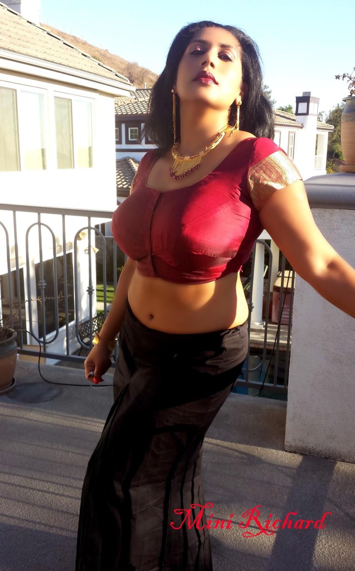 Denise Milani without a bra