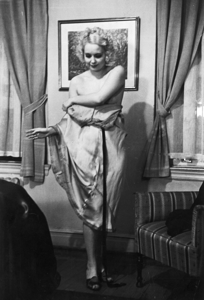 Wife undresses in front of her husband