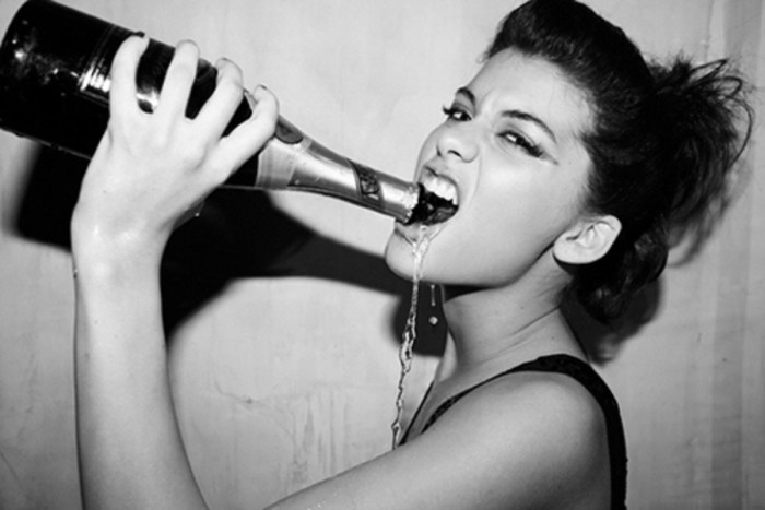 Girl with a bottle of champagne