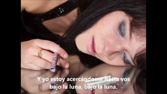 A man with a bottle in his hand