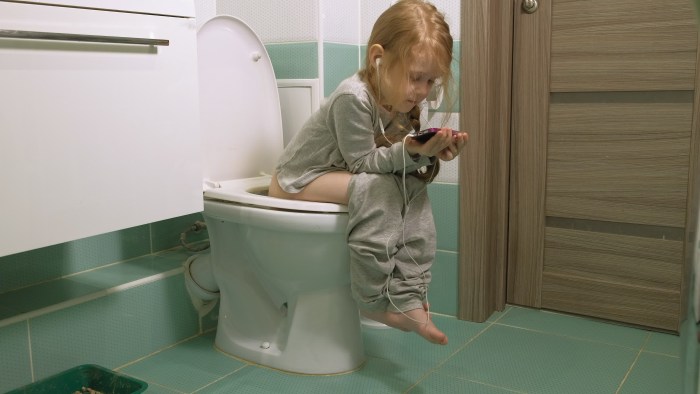 Girl on the toilet