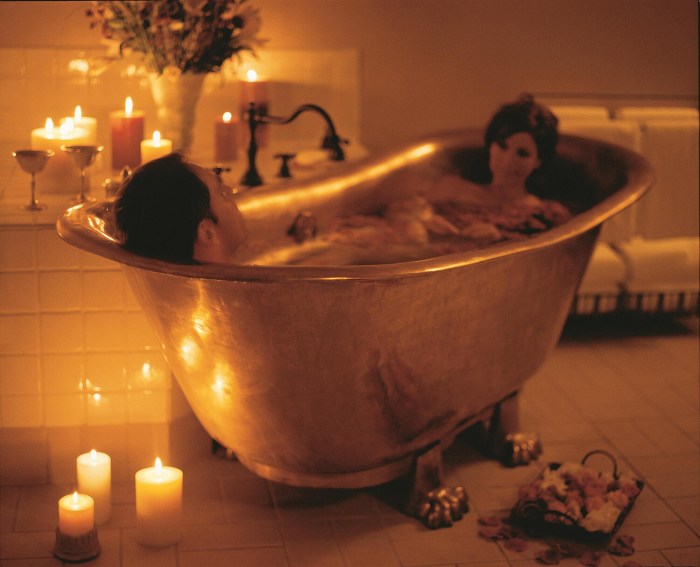 A guy with a girl in a bath