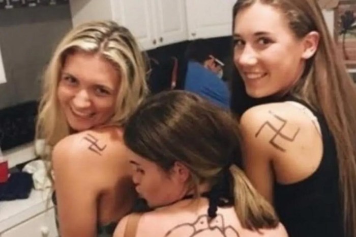 Girl with swastika tattoo