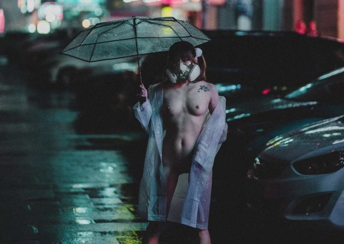 Naked women in the rain