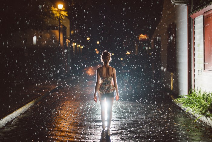Girl naked in the rain
