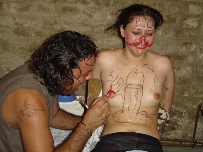 Naked women with inscriptions on the body