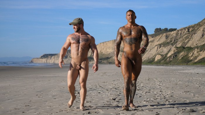 Naked men pumped on the beach