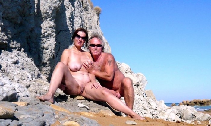 Family couples on a nudic beach