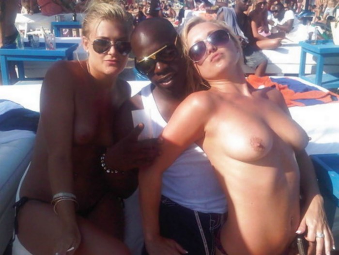 Wife Topless on the beach with a black man