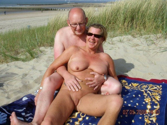 Naked mature pairs on the beach