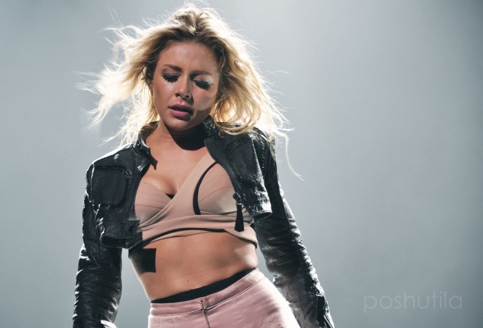 Tina Karol in leggings poses