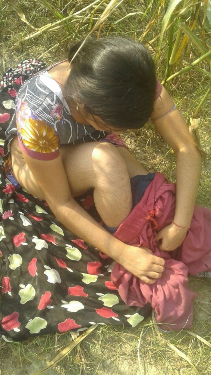 Naked women in a village bath