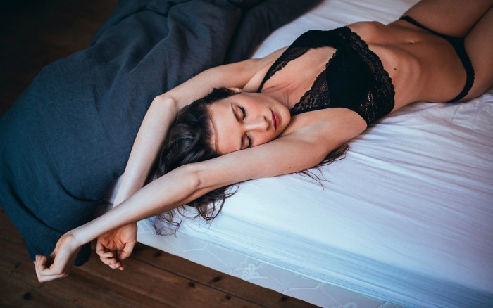 The girl lies on her back