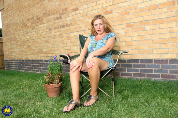 Naked women in the country in the garden