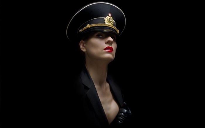 Girl in a police cap