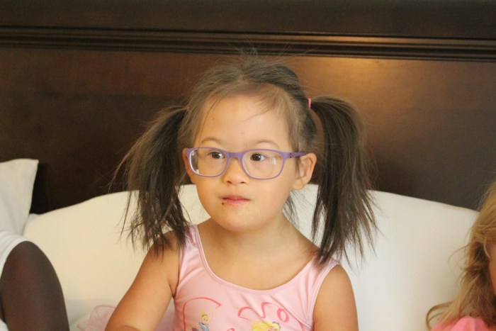 Baby feet on asphalt