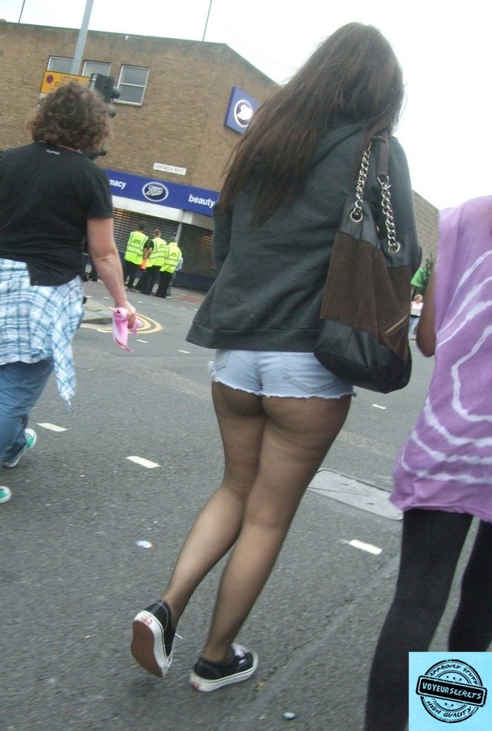Girl in panties on the lawn