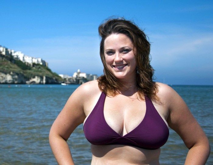 Big breasts of mature on the beach