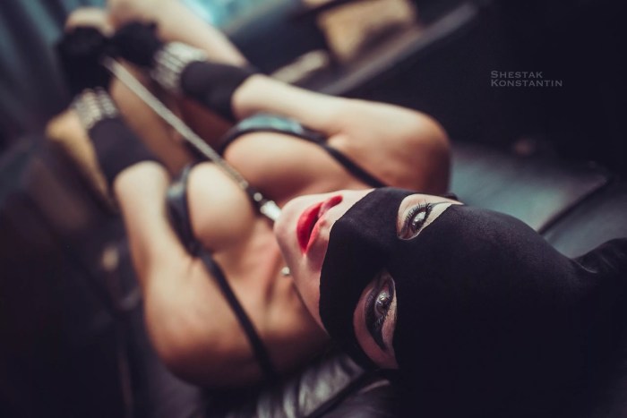 Beautiful bound girl in a mask