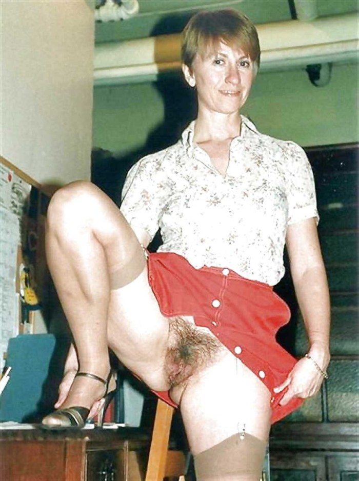 Mature shows under a skirt