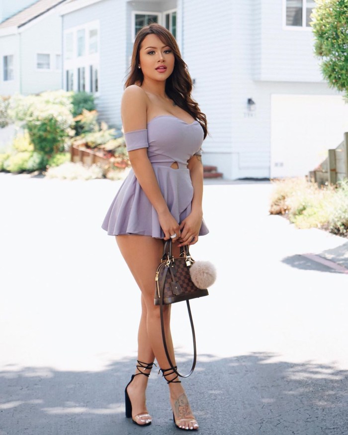 Naked woman in black peignoire