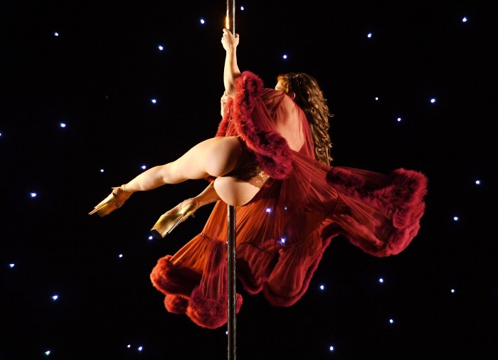 A student is dancing on a camera