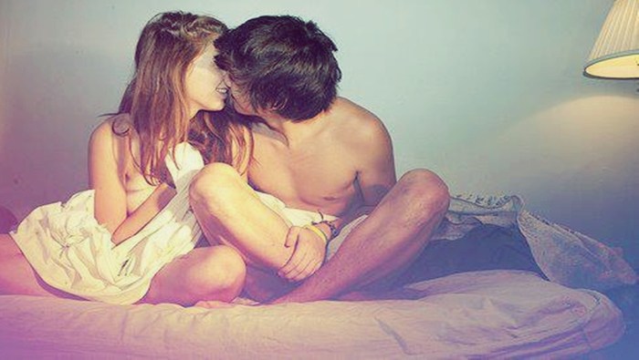 Kiss of minors in bed