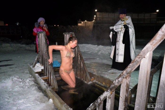Naked women bathe in the hole