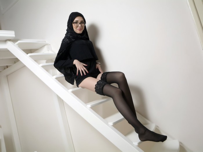 In hijab and stockings