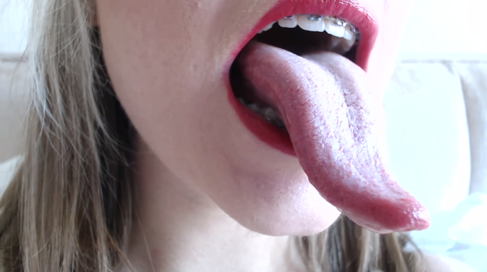 Pornstar with a punctured tongue