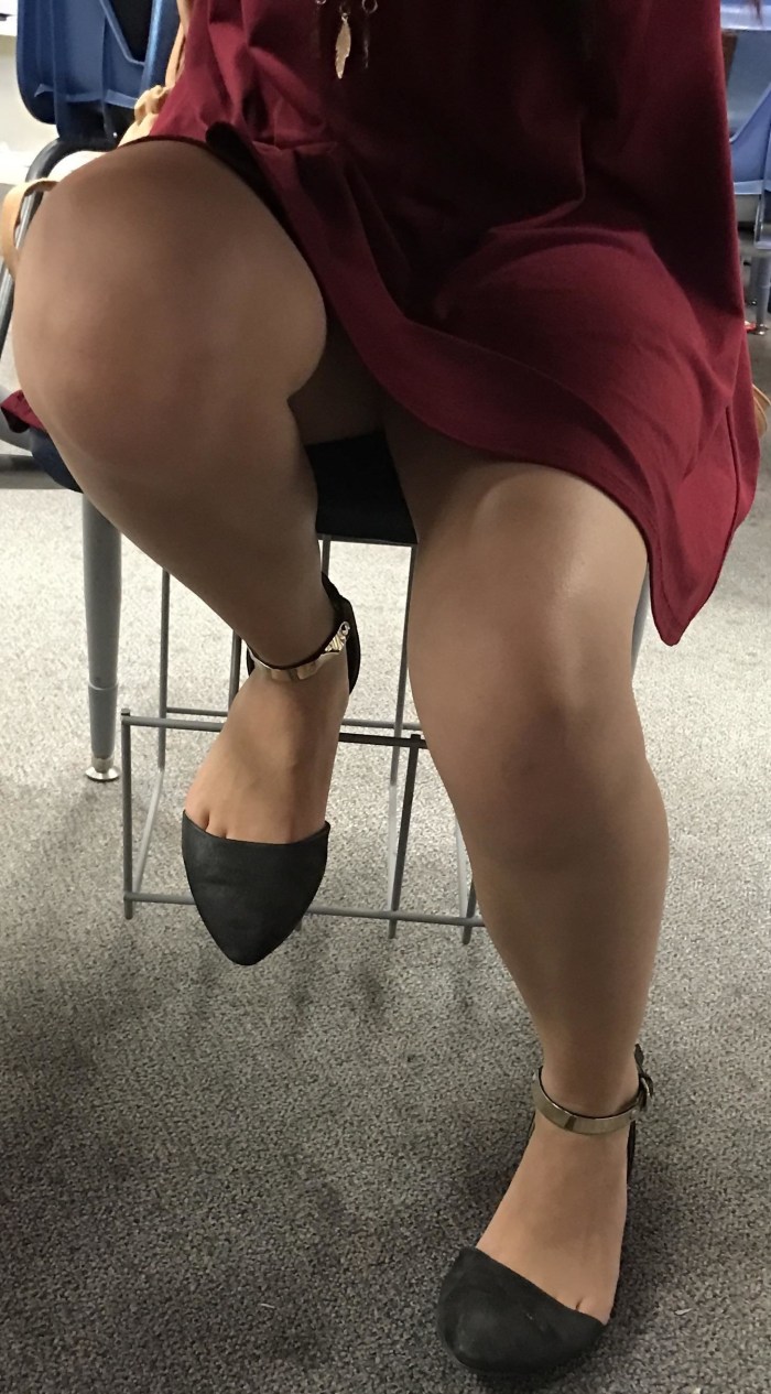 Leaned in a dress in the office