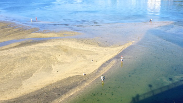 Girl swimming in the sea in front