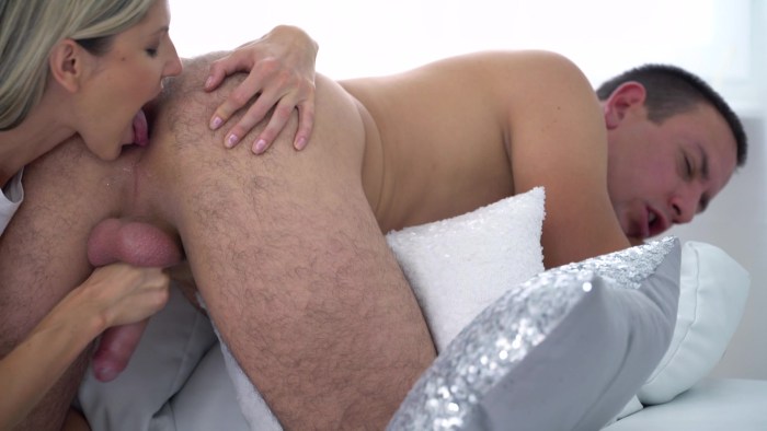 Woman licks anus man