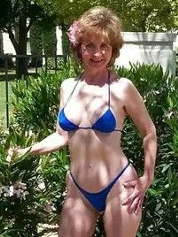 Elderly women in micro bikini